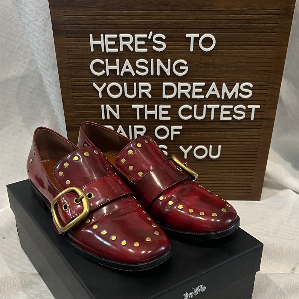 Coach brass detail oxblood buckle loafer